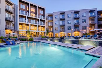 Swimming pool with sundeck and in-water seating